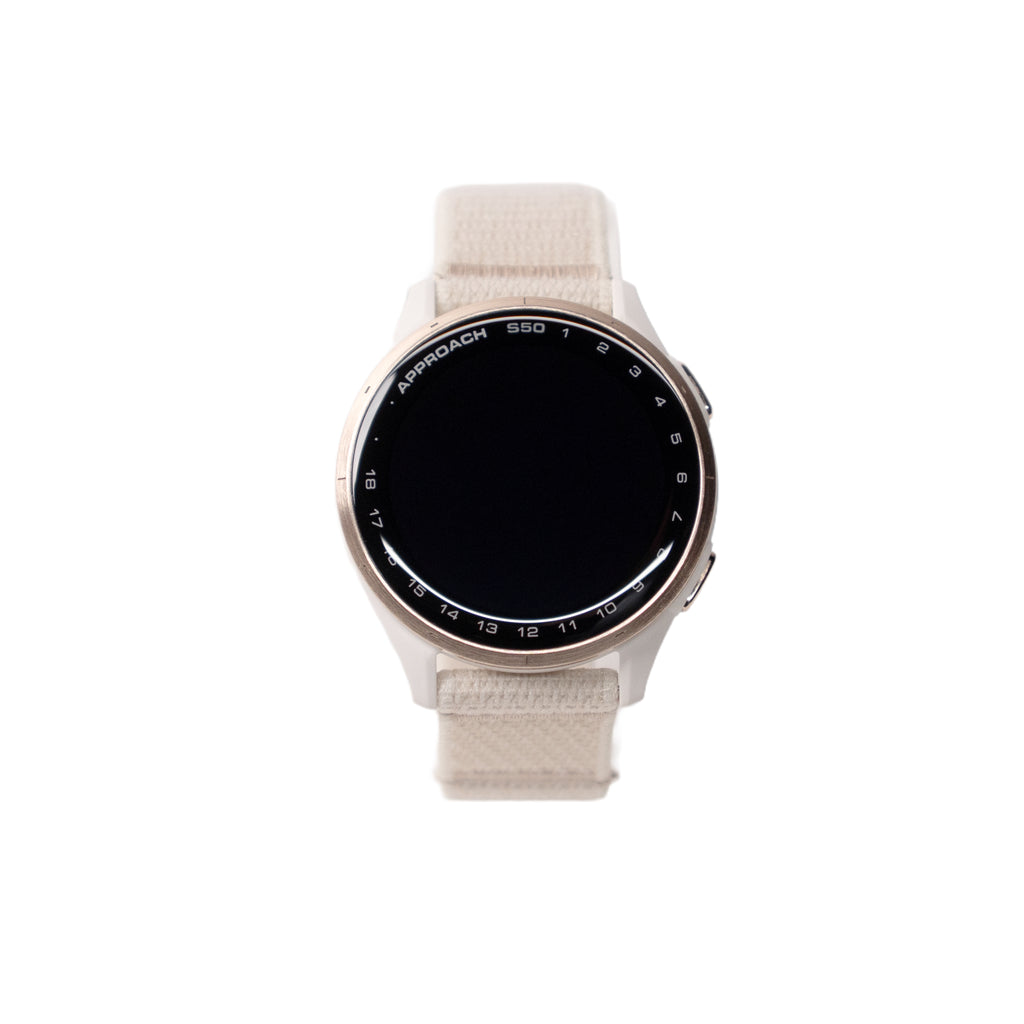 Smartwatch with a beige strap on a white background