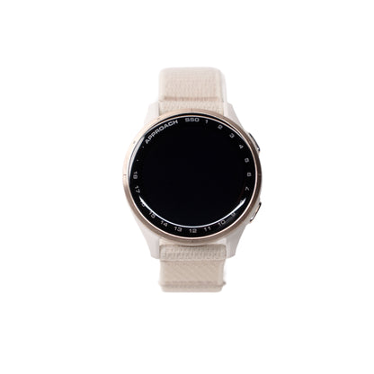 Smartwatch with a beige strap on a white background